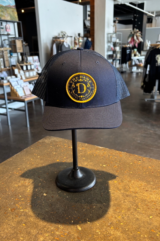 The Dame Trucker Hat